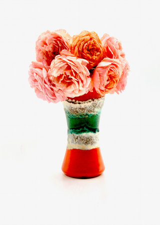 Bouquet of pink roses in vase isolated on white background