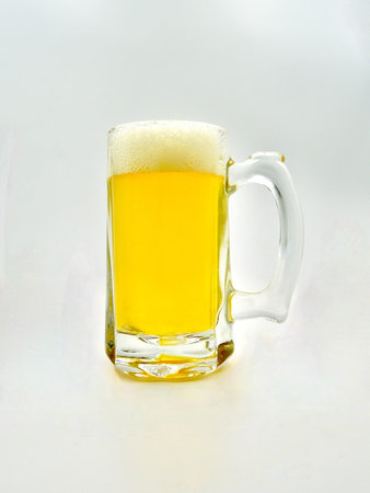 Mug of pilsner beer isolated on a white background. Beer mug.