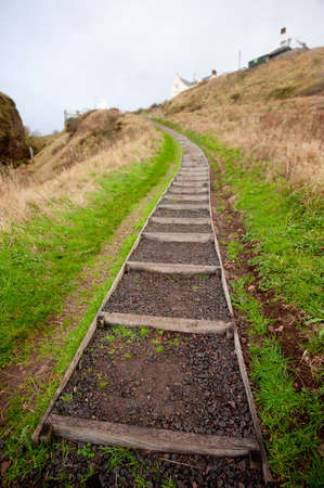 Steep steps leading to a hilltop villageの写真素材