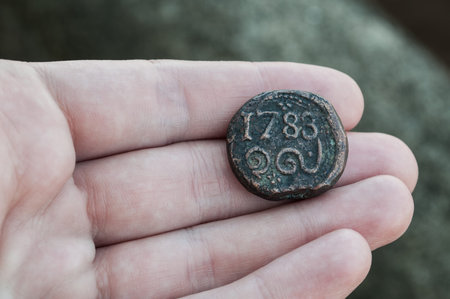 Save Download Preview The coin collector found an ancient coinの写真素材