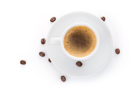 cup coffee on saucer isolated white background