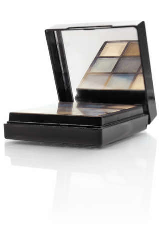 compact tonal means for face isolated on white backgroundの写真素材