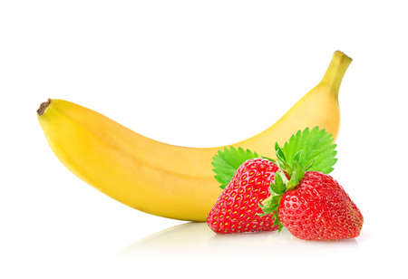 Ripe fresh banana and juicy strawberry with green leaf. Isolated on white backgroundの写真素材