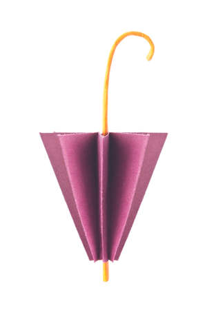Purple closed umbrella of origami, isolated on white backgroundの写真素材