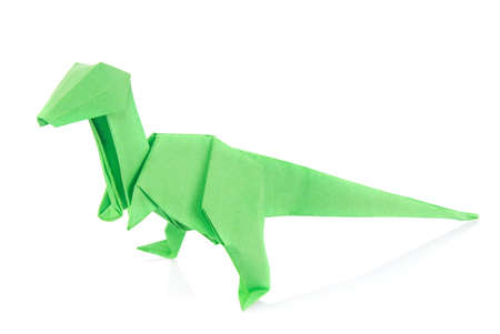 Green Velociraptor dinosaur of origami, isolated on white background.の写真素材