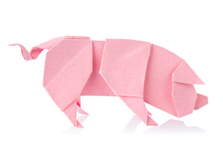 Pink pig of origami, isolated on white background.の写真素材