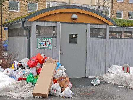 portrait of trash outside recycle house
