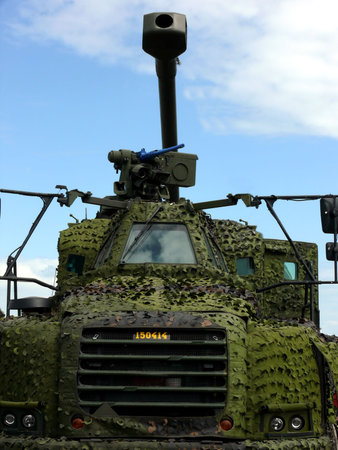portrait of military vehicle in blue sky