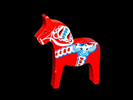 portrait of original swedish dala horse on black backgroundの写真素材