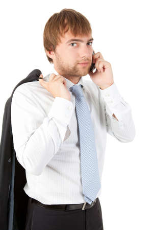 Handsome businessman talking on the phone, isolated on white background.の写真素材
