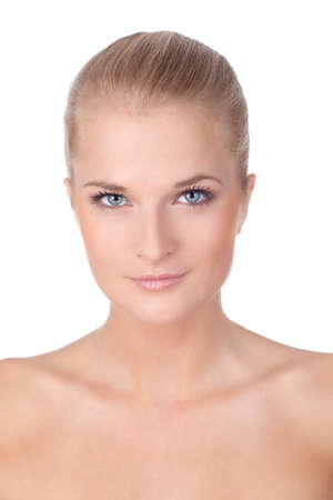 Closeup face of fashion model posing at studio. Looking at camera.  Isolated on white background.の写真素材