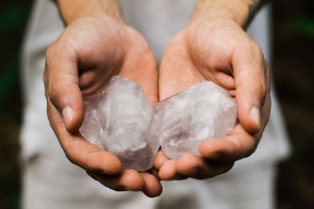 Hands holding crystal. Concept of occult symbolism and spiritual practice.の写真素材