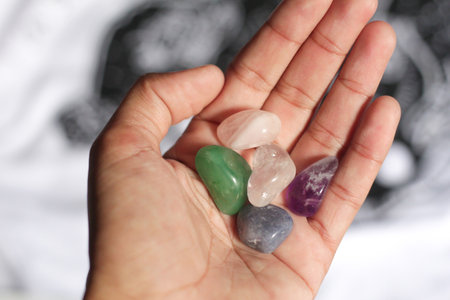Hands holding crystal. Concept of occult symbolism and spiritual practice.の写真素材