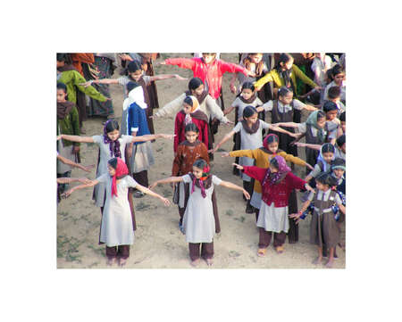 Ahmedabad, Gujarat, India - 26 November 2005 year.   School student in Ahmedabad. calisthenics, and relaxation, yoga. Gymnastic exercises to the sound of the drum.のeditorial素材