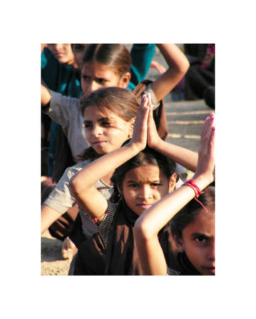 Ahmedabad, Gujarat, India - 26 November 2005 year.   School student in Ahmedabad. calisthenics, and relaxation, yoga. Gymnastic exercises to the sound of the drum.のeditorial素材