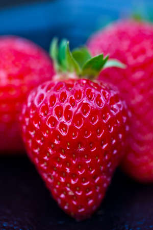 closeup of strawberry on black background の写真素材