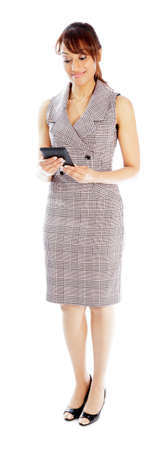 Indian business woman posing in studio isolated on a backgroundの写真素材