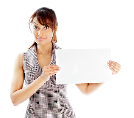 Indian business woman posing in studio isolated on a backgroundの写真素材