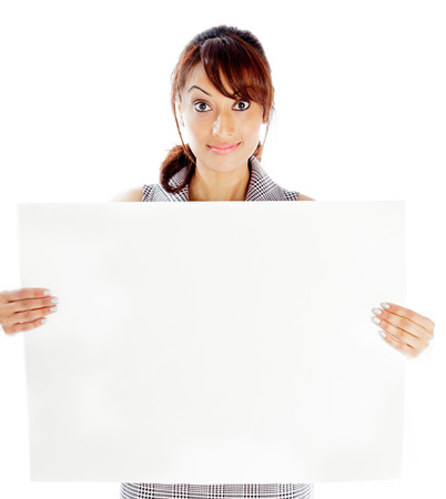 Indian business woman posing in studio isolated on a backgroundの写真素材