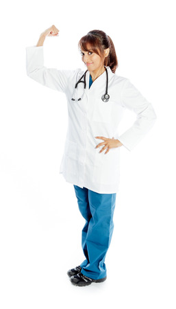 Attractive Indian doctor woman posing in a studio in front of a backgroundの写真素材