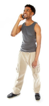 Attractive afro-american man posing in a  studio isolated on a backgroundの写真素材
