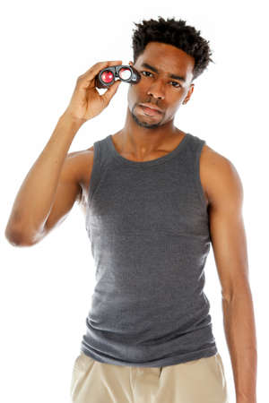 Attractive afro-american man posing in a  studio isolated on a backgroundの写真素材