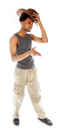 Attractive afro-american man posing in a  studio isolated on a backgroundの写真素材