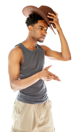Attractive afro-american man posing in a  studio isolated on a backgroundの写真素材