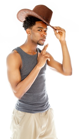 Attractive afro-american man posing in a  studio isolated on a backgroundの写真素材
