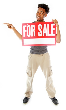Attractive afro-american man posing in a  studio isolated on a backgroundの写真素材