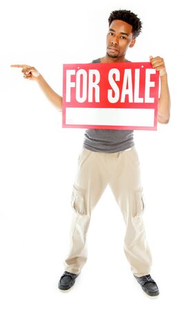 Attractive afro-american man posing in a  studio isolated on a backgroundの写真素材