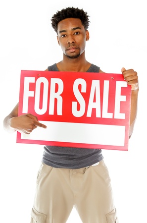 Attractive afro-american man posing in a  studio isolated on a backgroundの写真素材