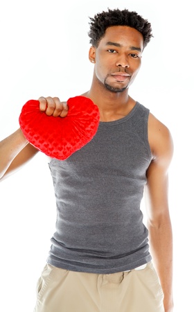 Attractive afro-american man posing in a  studio isolated on a backgroundの写真素材