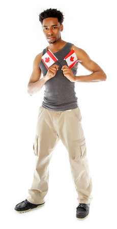 Attractive afro-american man posing in a  studio isolated on a backgroundの写真素材