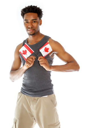 Attractive afro-american man posing in a  studio isolated on a backgroundの写真素材
