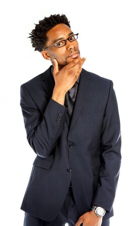 Attractive afro-american business man posing in studio isolated on a white backgroundの写真素材