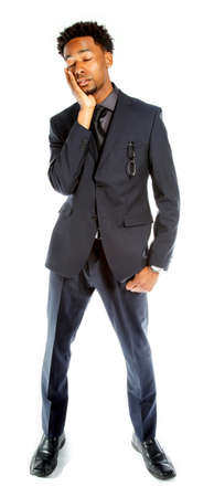 Attractive afro-american business man posing in studio isolated on a white backgroundの写真素材