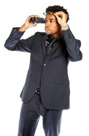 Attractive afro-american business man posing in studio isolated on a white backgroundの写真素材