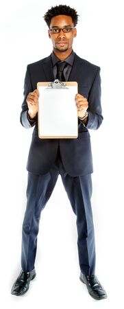 Attractive afro-american business man posing in studio isolated on a white backgroundの写真素材