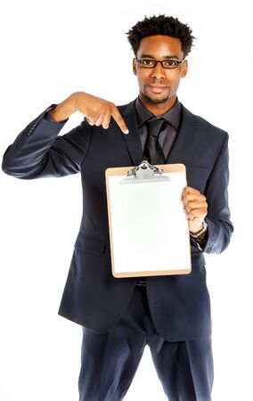 Attractive afro-american business man posing in studio isolated on a white backgroundの写真素材