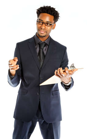 Attractive afro-american business man posing in studio isolated on a white backgroundの写真素材