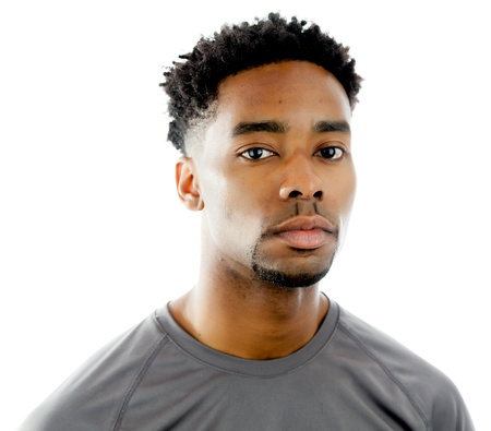 Attractive afro-american man posing in a  studio isolated on a backgroundの写真素材