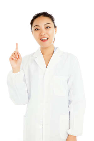 Attractive asian girl in her twenties isolated on a plein background shot in a studioの写真素材
