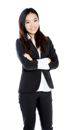 Attractive asian girl in her twenties isolated on a plein background shot in a studioの写真素材