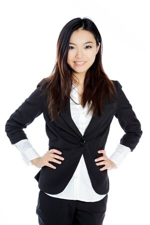 Attractive asian girl in her twenties isolated on a plein background shot in a studioの写真素材