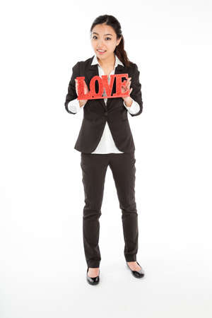 Romantic people in love shot in studio isolated on a white backgroundの写真素材