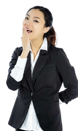 Attractive asian girl in her twenties isolated on a plein background shot in a studioの写真素材
