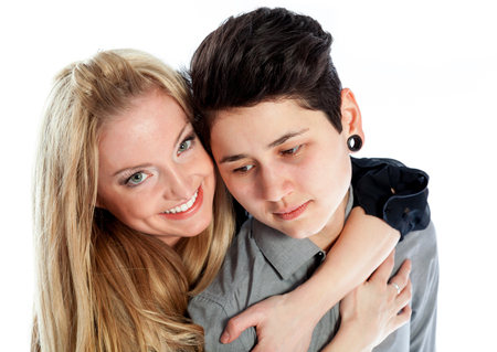 Cute Lesbian couple 30 years old shot in studio isolated on a white backgroundの写真素材