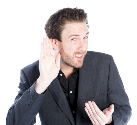 Attractive 30 years old caucasion man shot in studio isolated on a white background