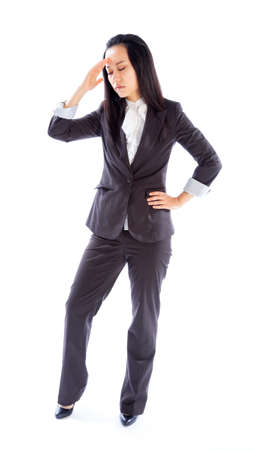 Attractive asian girl in her 30s shot in studio isolated on a white backgroundの写真素材
